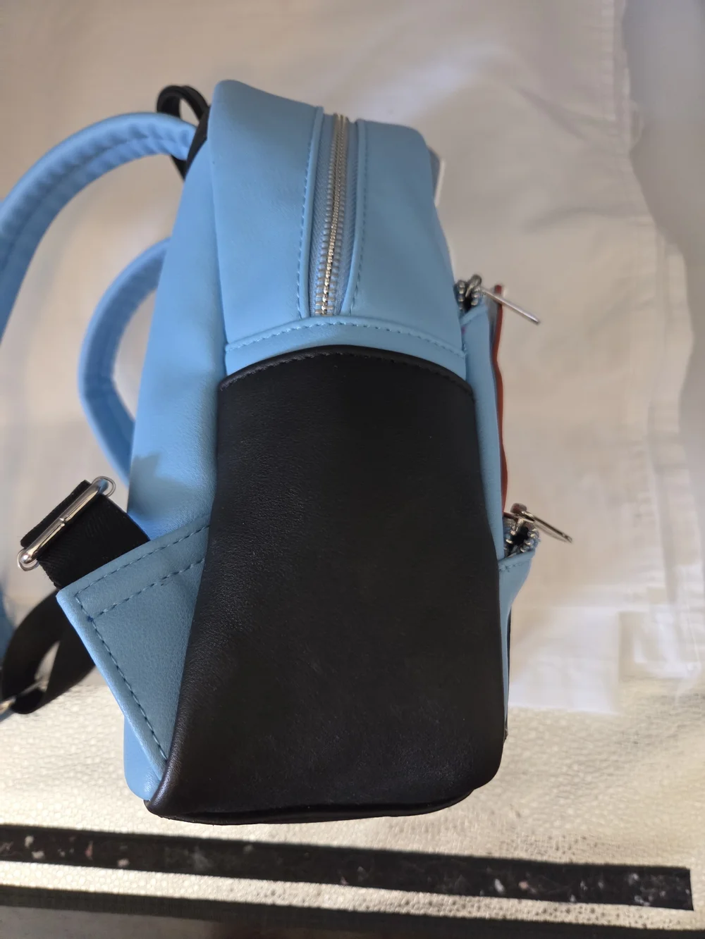 Loungefly Disney Parks Mini Backpack Festuring Rolly, Lady & Pluto
